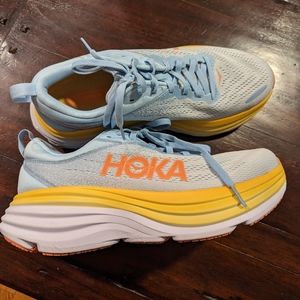 Hokas worn once on treadmill.